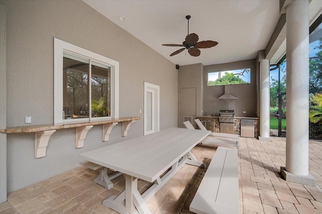 view of patio / terrace featuring an outdoor kitchen, area for grilling, and ceiling fan