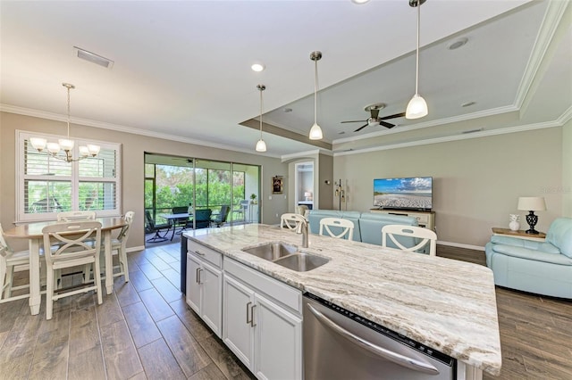 kitchen with an island with sink, white cabinetry, stainless steel dishwasher, dark wood-type flooring, and sink