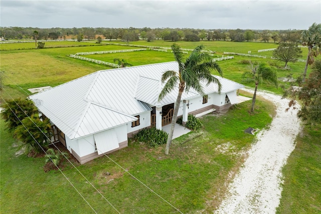 birds eye view of property featuring a rural view