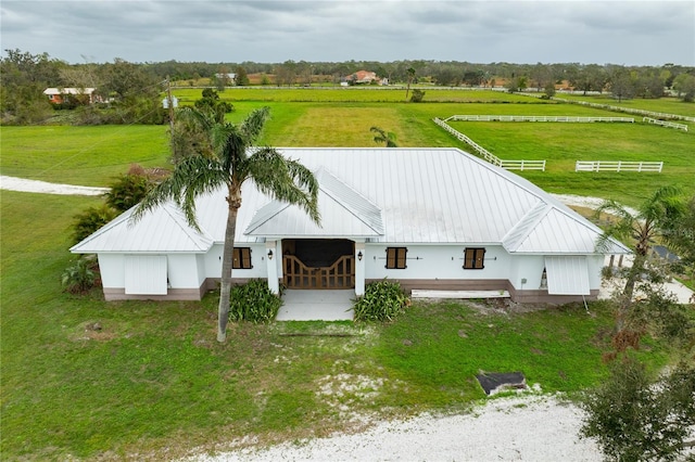 birds eye view of property featuring a rural view