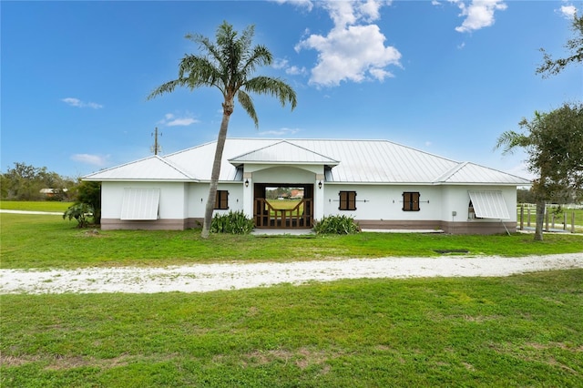 exterior space featuring a front yard