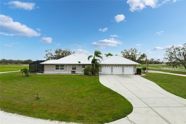 ranch-style home with a garage, glass enclosure, and a front lawn