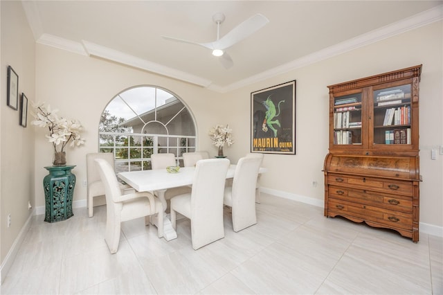 dining room featuring crown molding and ceiling fan