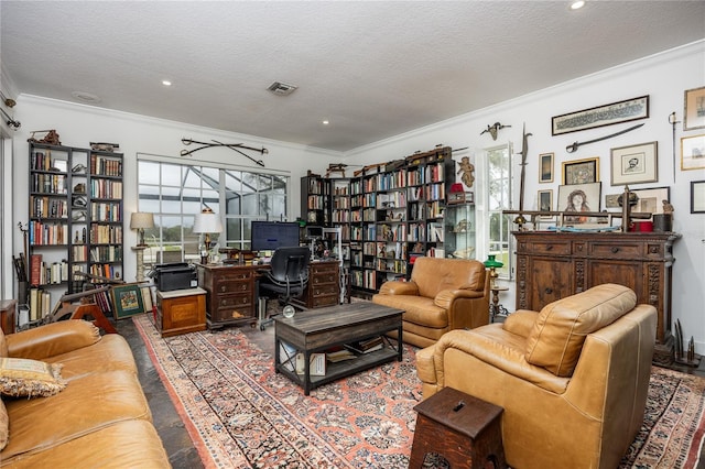 sitting room featuring ornamental molding, a healthy amount of sunlight, and a textured ceiling