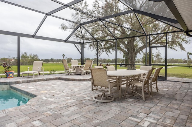 view of patio / terrace with glass enclosure