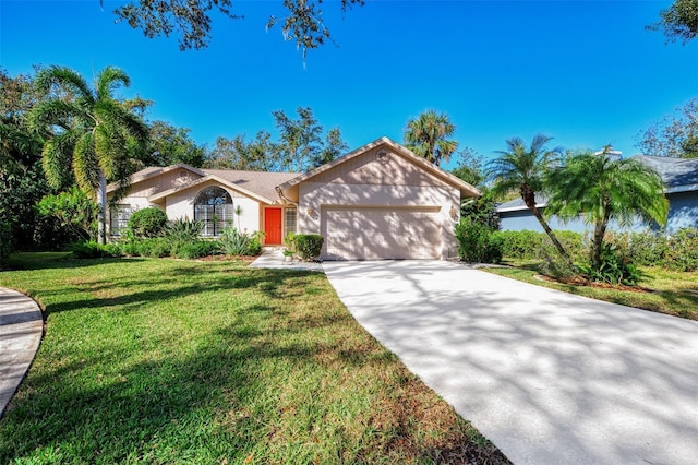 single story home with a front yard and a garage