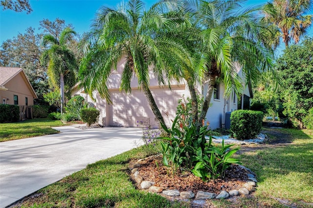 view of property exterior featuring a lawn