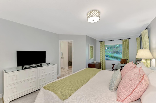 tiled bedroom with connected bathroom