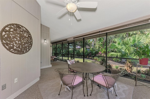 sunroom / solarium featuring ceiling fan