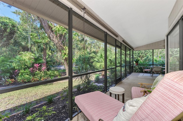 sunroom with vaulted ceiling