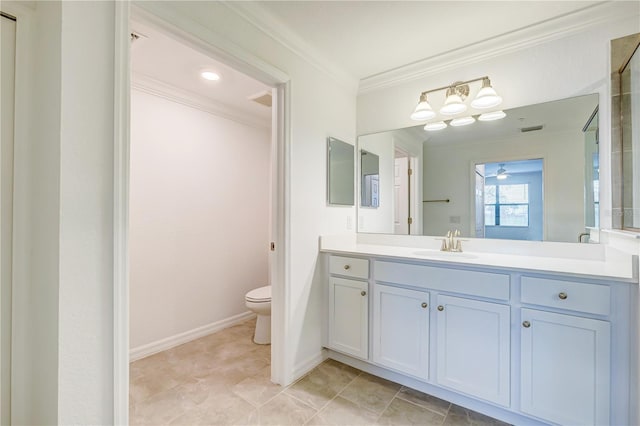 bathroom featuring vanity, toilet, ceiling fan, and ornamental molding