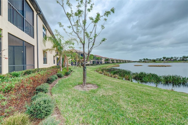 view of yard with a water view