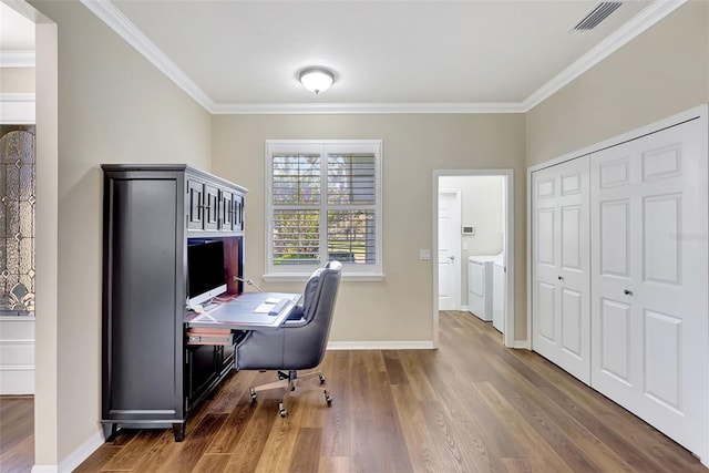 office area with ornamental molding and dark hardwood / wood-style flooring