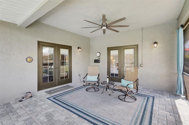 view of patio featuring french doors and ceiling fan