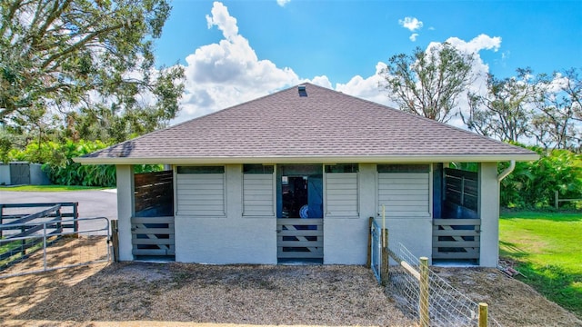 view of front facade with an outbuilding