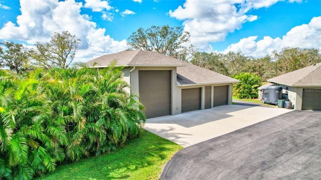 view of property exterior featuring a garage