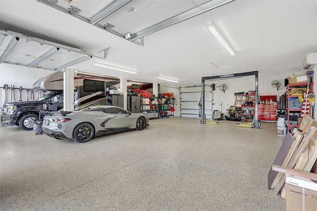 garage featuring an AC wall unit