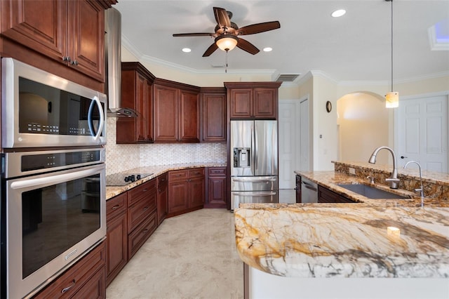 kitchen featuring backsplash, pendant lighting, crown molding, and stainless steel appliances