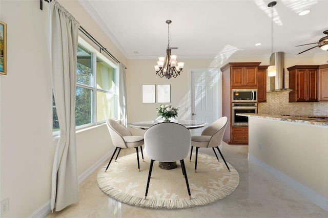 dining room with ceiling fan with notable chandelier and ornamental molding