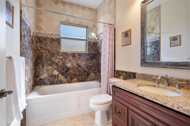 full bathroom with shower / tub combo with curtain, vanity, and toilet