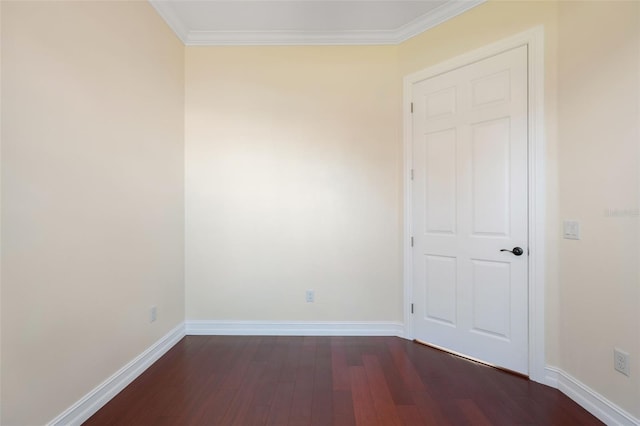 unfurnished room with crown molding and dark hardwood / wood-style flooring