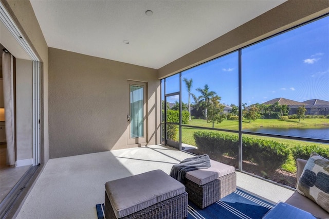 sunroom with a water view