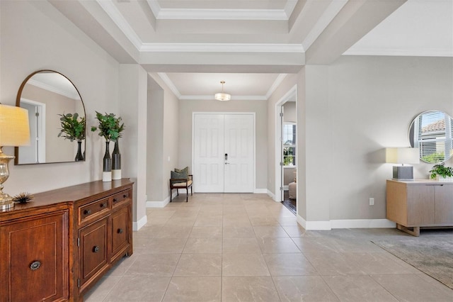 tiled entrance foyer featuring ornamental molding