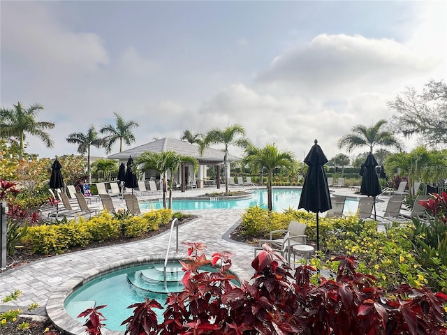 view of swimming pool featuring a patio area