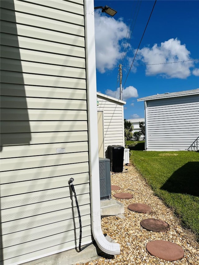 view of property exterior featuring central air condition unit