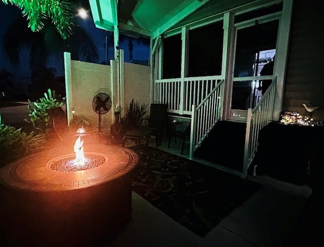 view of patio / terrace featuring an outdoor fire pit