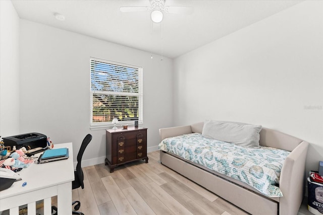 bedroom featuring ceiling fan and light hardwood / wood-style floors