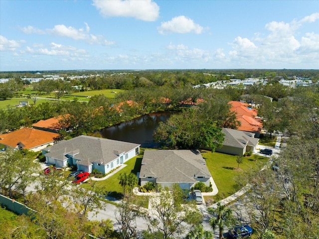 drone / aerial view with a water view