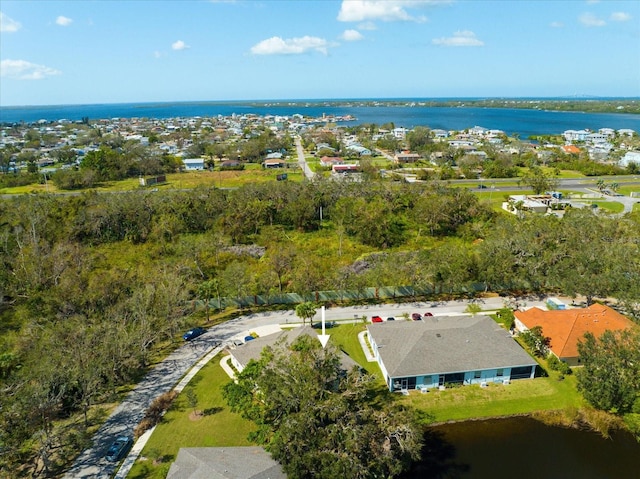 birds eye view of property featuring a water view