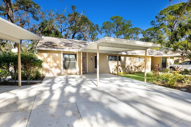 view of front of house with a carport