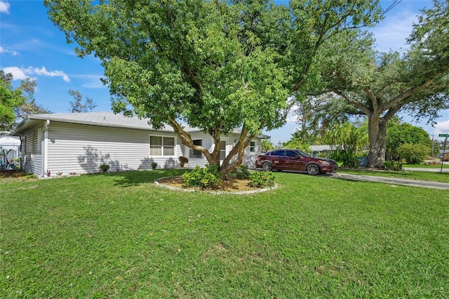 view of front of house with a front lawn