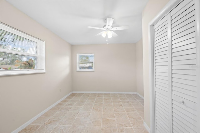 spare room featuring ceiling fan