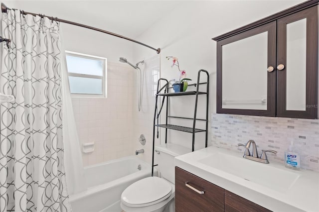 full bathroom featuring vanity, decorative backsplash, shower / tub combo with curtain, and toilet