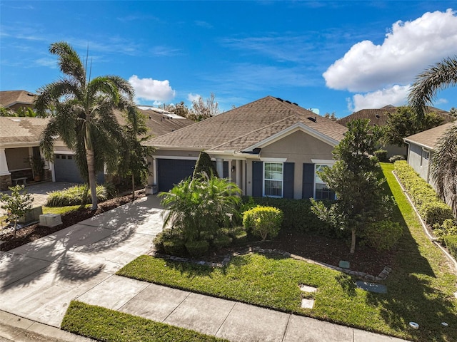 ranch-style house featuring concrete driveway, a shingled roof, an attached garage, and stucco siding