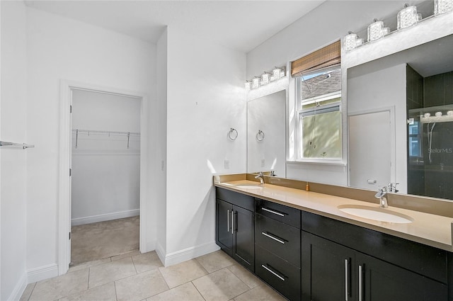 bathroom featuring vanity and tile patterned floors