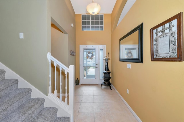 entrance foyer with light tile patterned floors