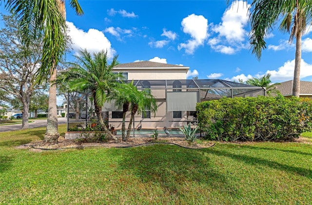 view of yard featuring a lanai