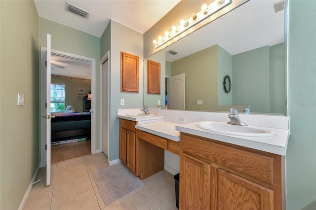 bathroom with vanity and tile patterned floors