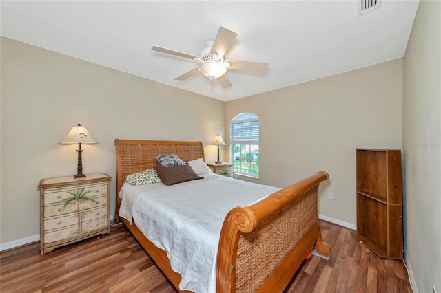 bedroom featuring hardwood / wood-style floors and ceiling fan