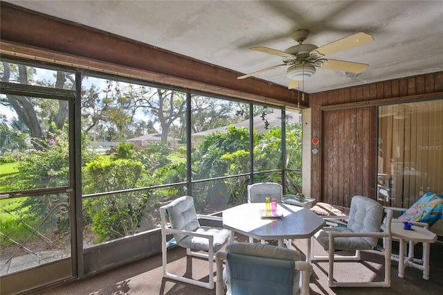 sunroom / solarium with ceiling fan