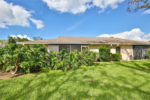 exterior space featuring a lawn