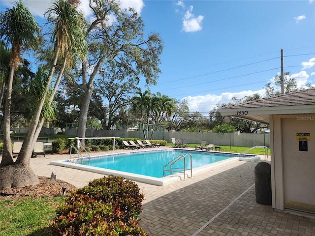 view of pool featuring a patio