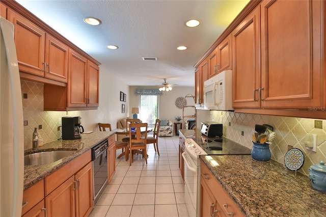 kitchen with stainless steel range with electric stovetop, dark stone counters, light tile patterned floors, black dishwasher, and ceiling fan