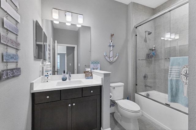 full bathroom with tile patterned flooring, vanity, toilet, and enclosed tub / shower combo