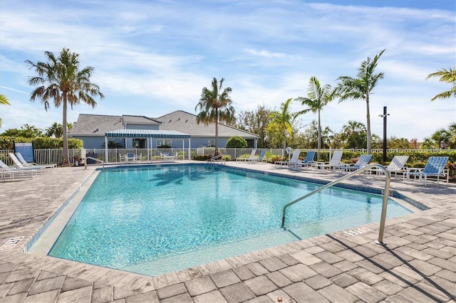 view of swimming pool with a patio area