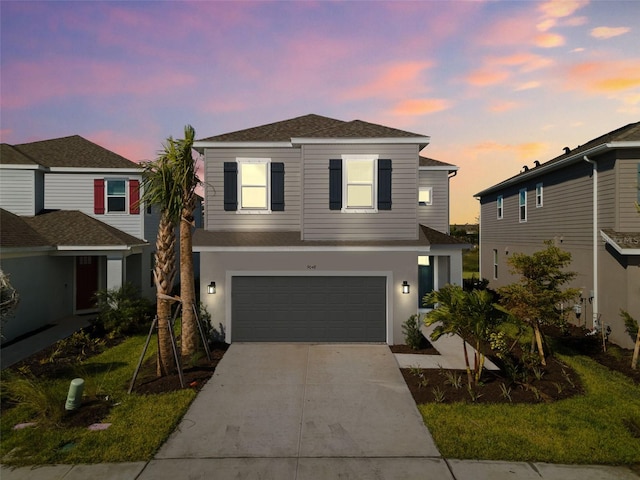 front facade with a garage